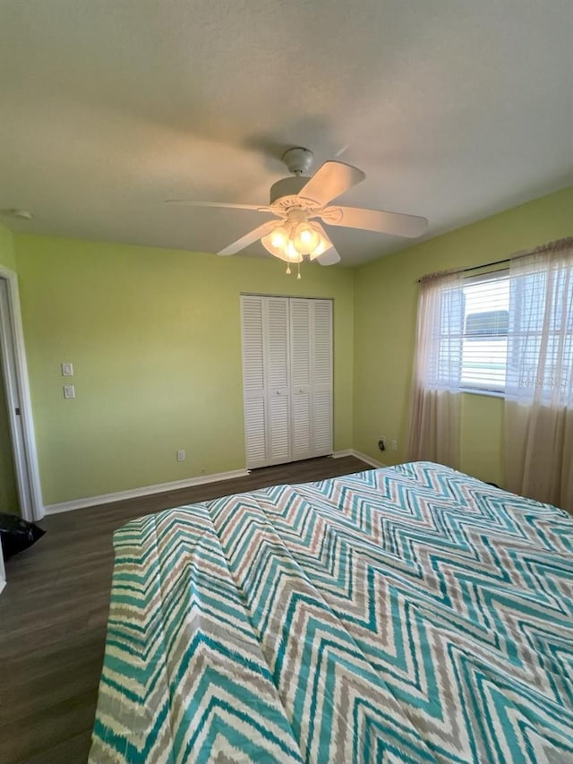 4290 Randypaar St, Port Charlotte, FL 33948 - unfurnished bedroom with dark wood-style flooring, a ceiling fan, and a closet