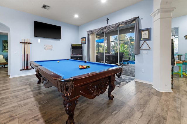 game room featuring hardwood / wood-style floors, ornate columns, and pool table