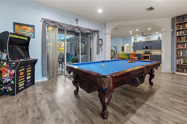 playroom with ornate columns, light hardwood / wood-style flooring, and billiards