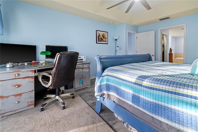 carpeted bedroom with ceiling fan