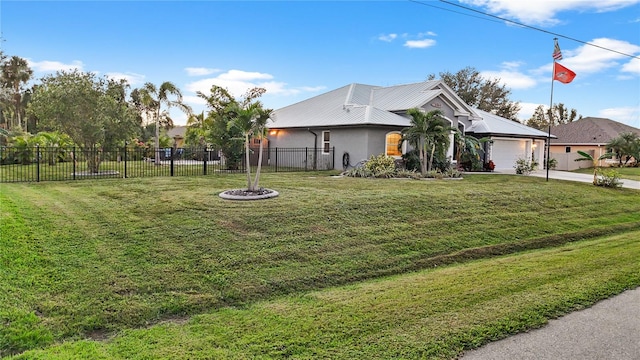 exterior space with a front yard and a garage