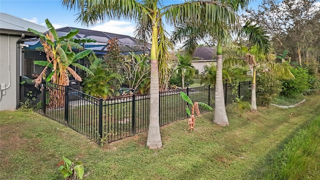 view of yard with a lanai