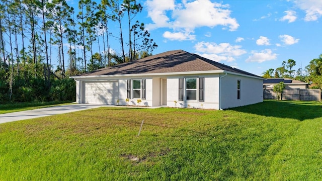 single story home with a garage and a front yard