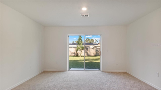 view of carpeted spare room