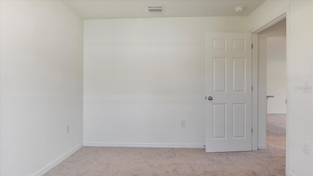 empty room with light carpet