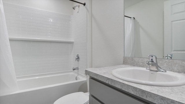 full bathroom with toilet, vanity, and shower / tub combo with curtain