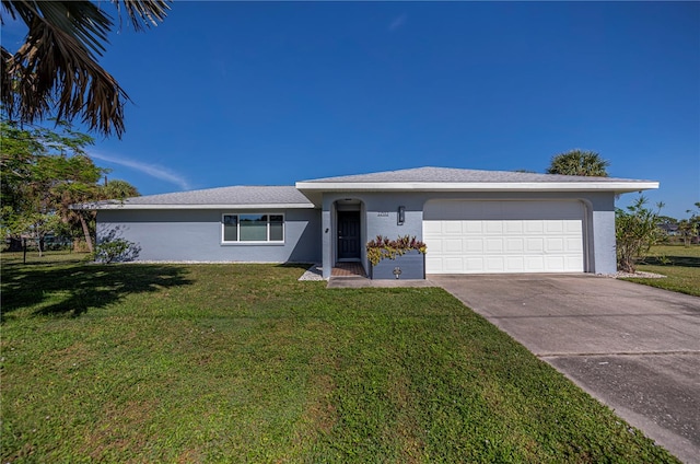 single story home with a garage and a front yard