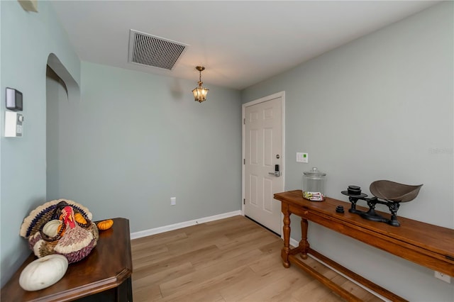 foyer with light hardwood / wood-style flooring