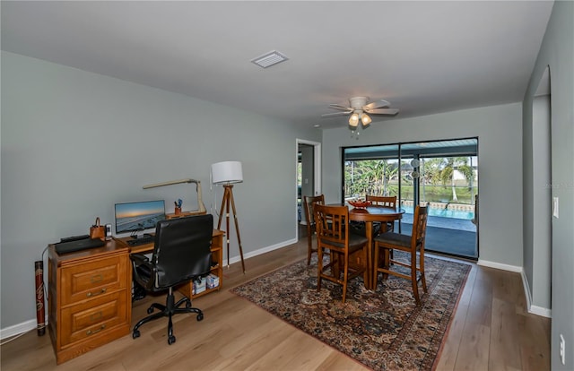 dining area featuring ceiling fan and light hardwood / wood-style floors