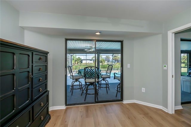 dining room featuring ceiling fan and light hardwood / wood-style flooring