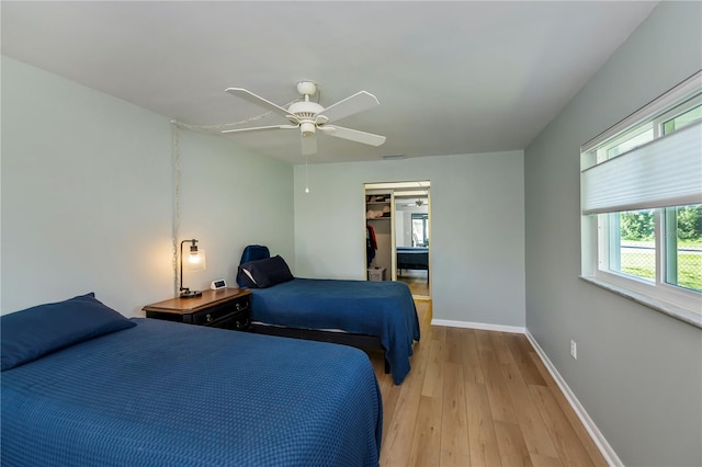 bedroom featuring ceiling fan and light hardwood / wood-style floors