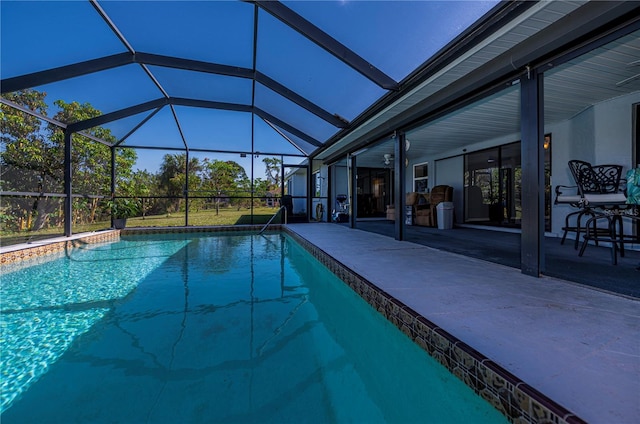 view of pool featuring a lanai and a patio area