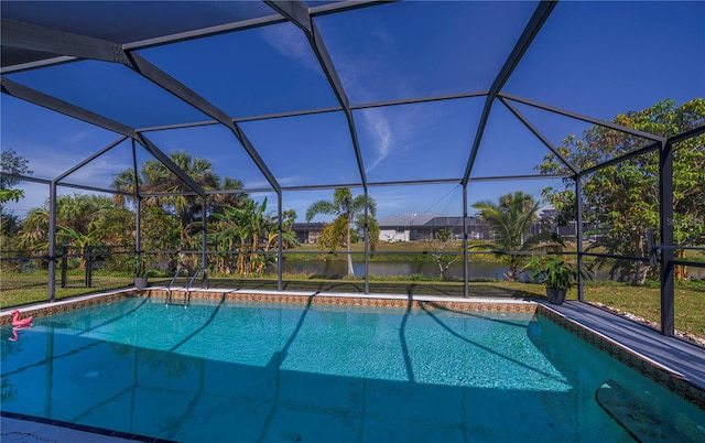 view of swimming pool featuring a water view and glass enclosure