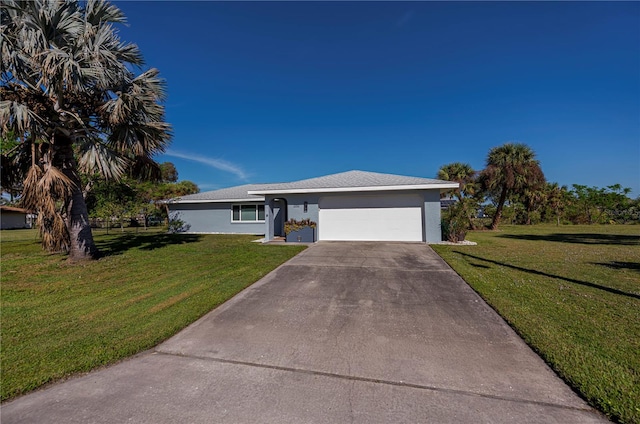 single story home with a garage and a front yard