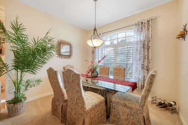 view of carpeted dining space