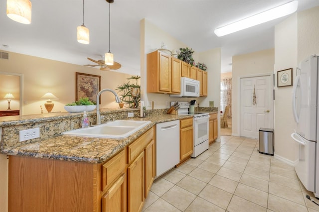 kitchen with white appliances, sink, ceiling fan, light tile patterned floors, and decorative light fixtures