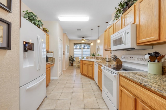 kitchen with ceiling fan, hanging light fixtures, kitchen peninsula, white appliances, and light tile patterned floors