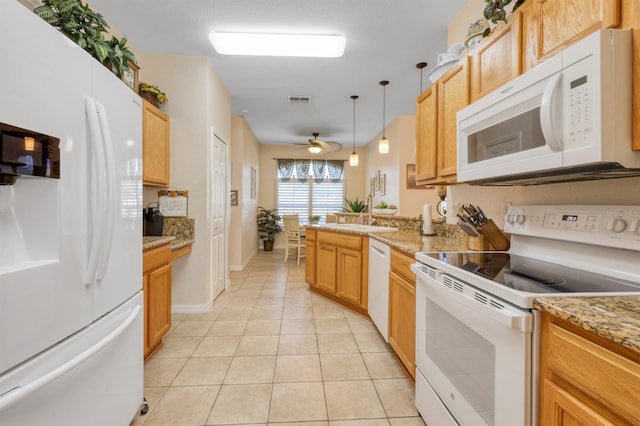 kitchen featuring white appliances, ceiling fan, sink, pendant lighting, and light tile patterned floors