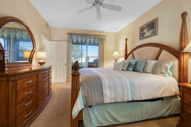 bedroom with dark colored carpet and ceiling fan