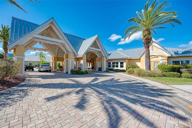 view of front of property with a carport