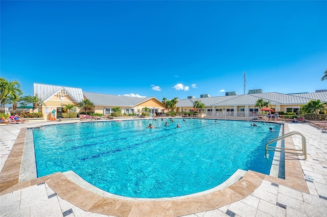 view of swimming pool featuring a patio area