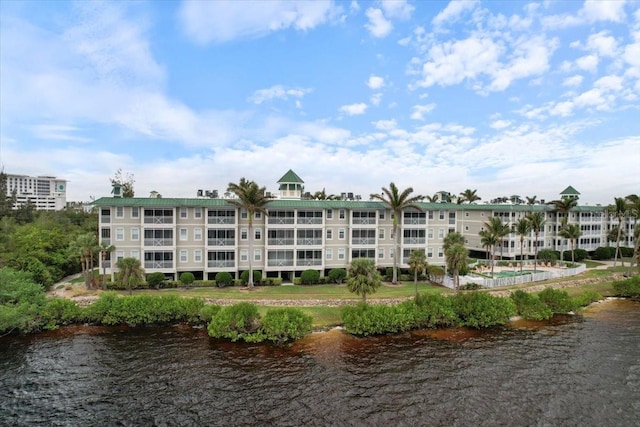 view of property with a water view