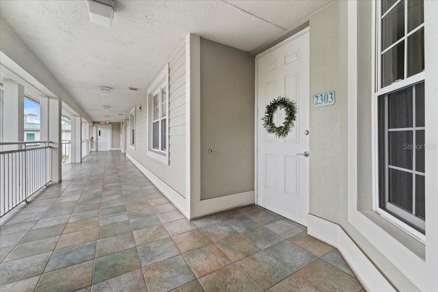 property entrance with covered porch