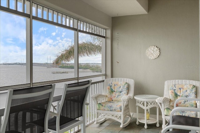 sunroom with a water view