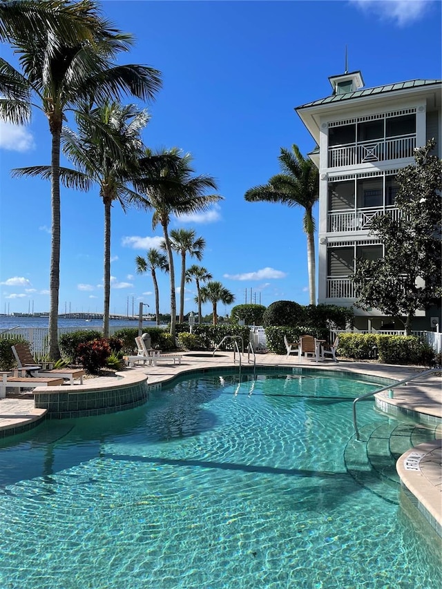 view of swimming pool with a patio area