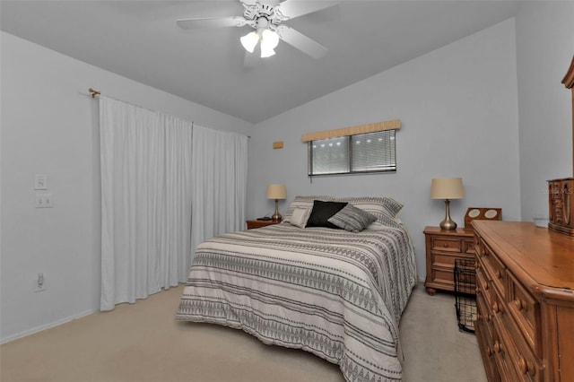 carpeted bedroom featuring ceiling fan and lofted ceiling