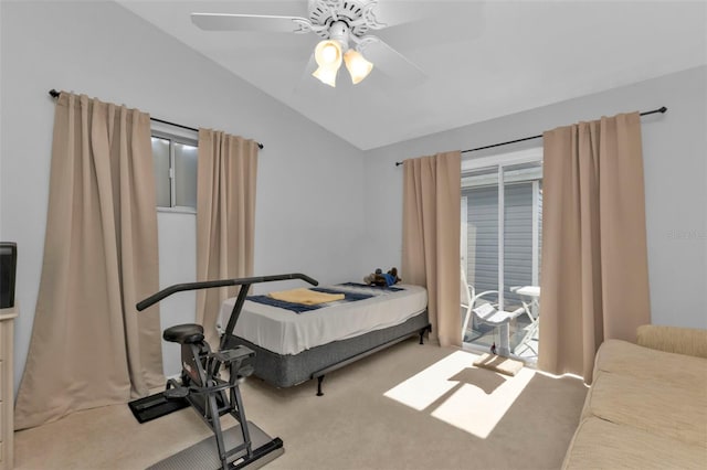 bedroom featuring carpet flooring, vaulted ceiling, and ceiling fan