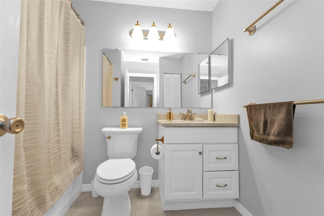 full bathroom with tile patterned flooring, vanity, toilet, and shower / tub combo