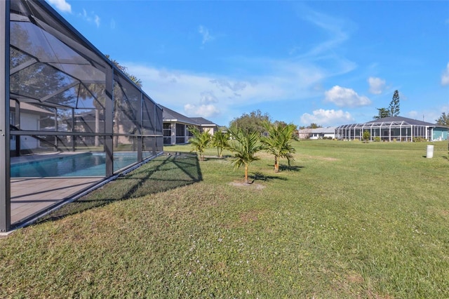 view of yard with a lanai