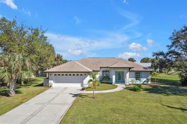 ranch-style house with a garage and a front yard