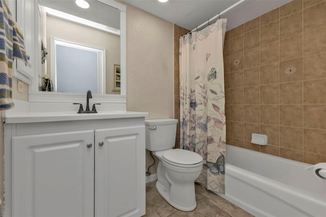bathroom with tile patterned floors, toilet, vanity, and shower / bath combination with curtain