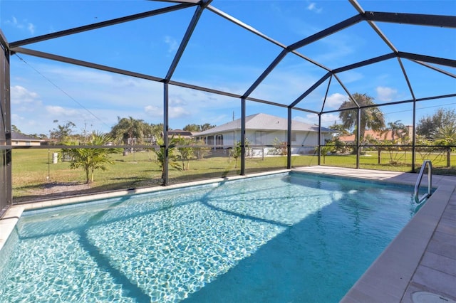 outdoor pool featuring a lanai, a lawn, and a patio