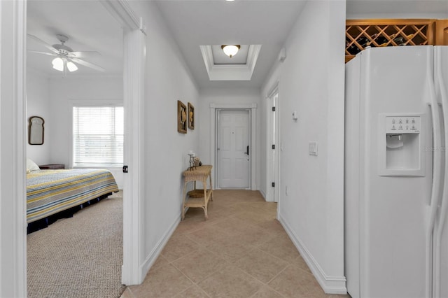 corridor with light tile patterned floors