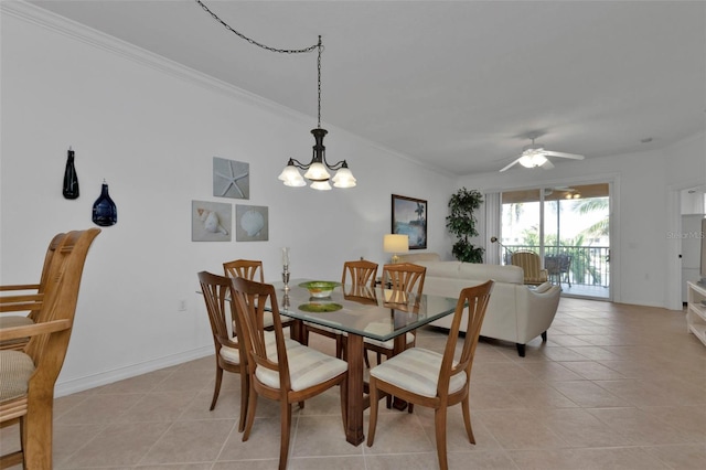 dining area featuring ceiling fan with notable chandelier, light tile patterned flooring, and ornamental molding