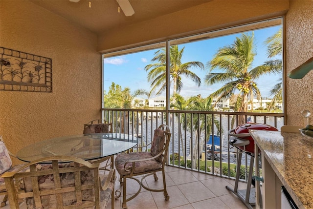 balcony featuring a water view