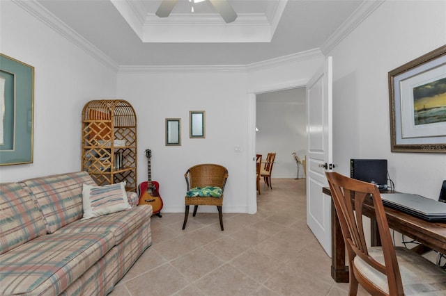 living room featuring ceiling fan, a raised ceiling, and crown molding