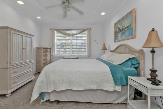 bedroom featuring ceiling fan, light colored carpet, and ornamental molding