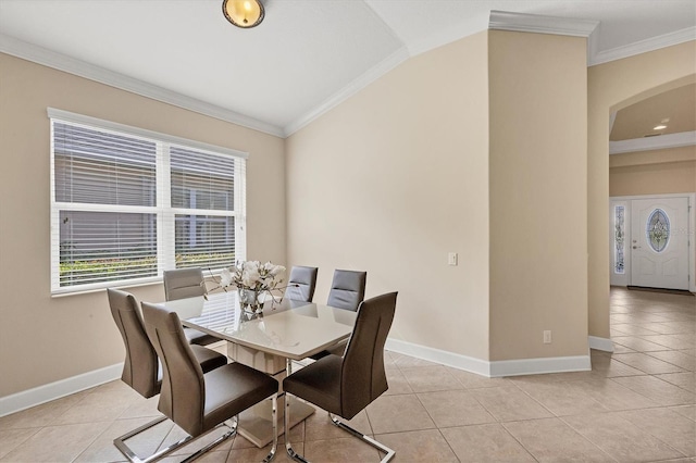 tiled dining room with ornamental molding