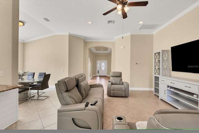 tiled living room featuring ceiling fan and crown molding