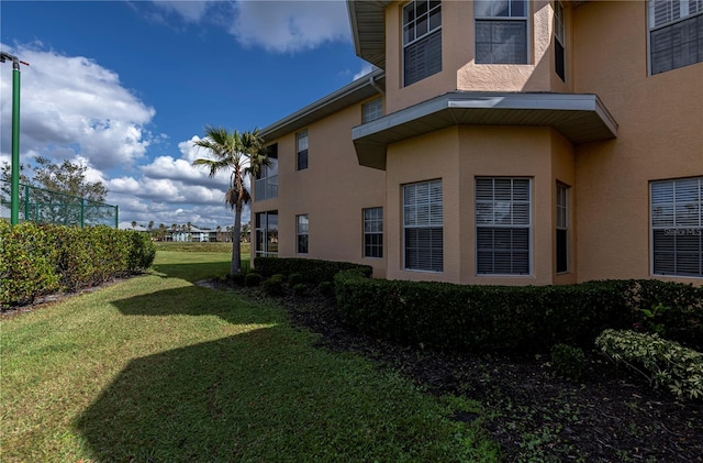 exterior space with a yard