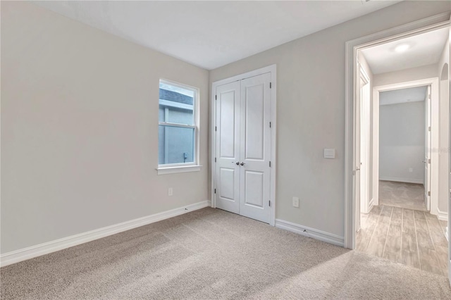 unfurnished bedroom with carpet