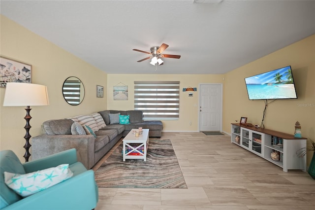 living room with ceiling fan