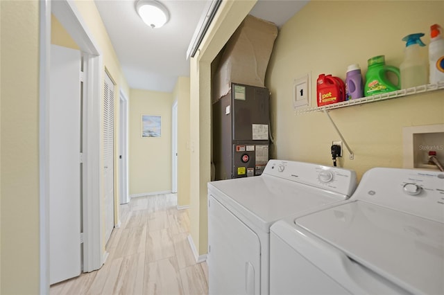 washroom with independent washer and dryer and heating unit