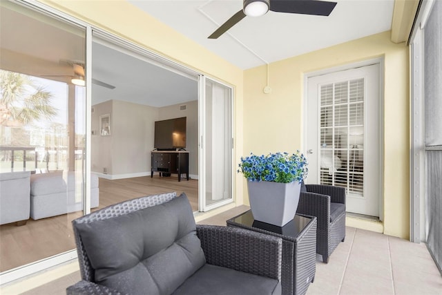 interior space featuring ceiling fan