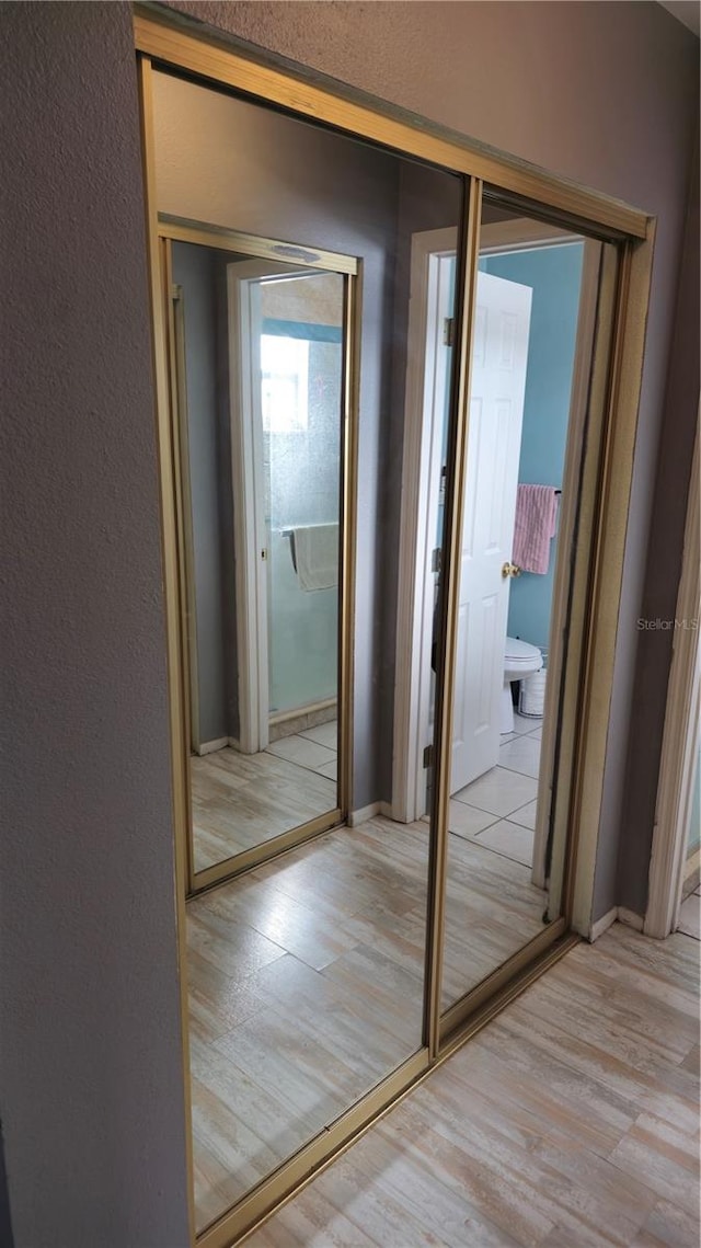 hallway featuring light hardwood / wood-style flooring