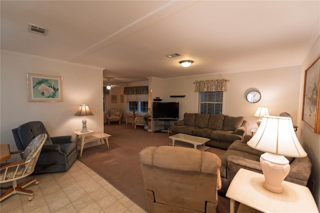 carpeted living room with ceiling fan and ornamental molding